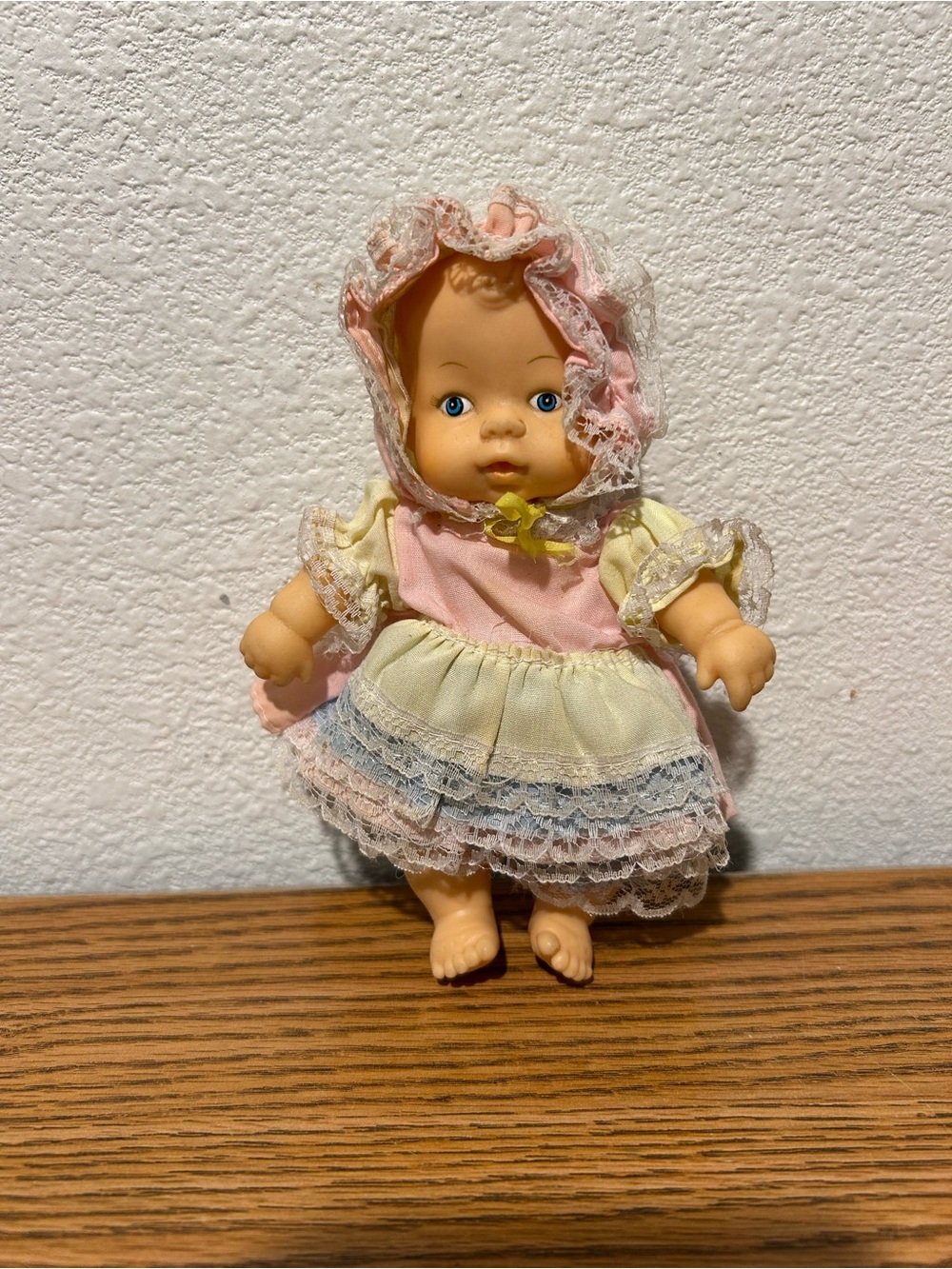 Vintage Uneeda  Baby Doll in Pink, Yellow & Blue Frilly Dress